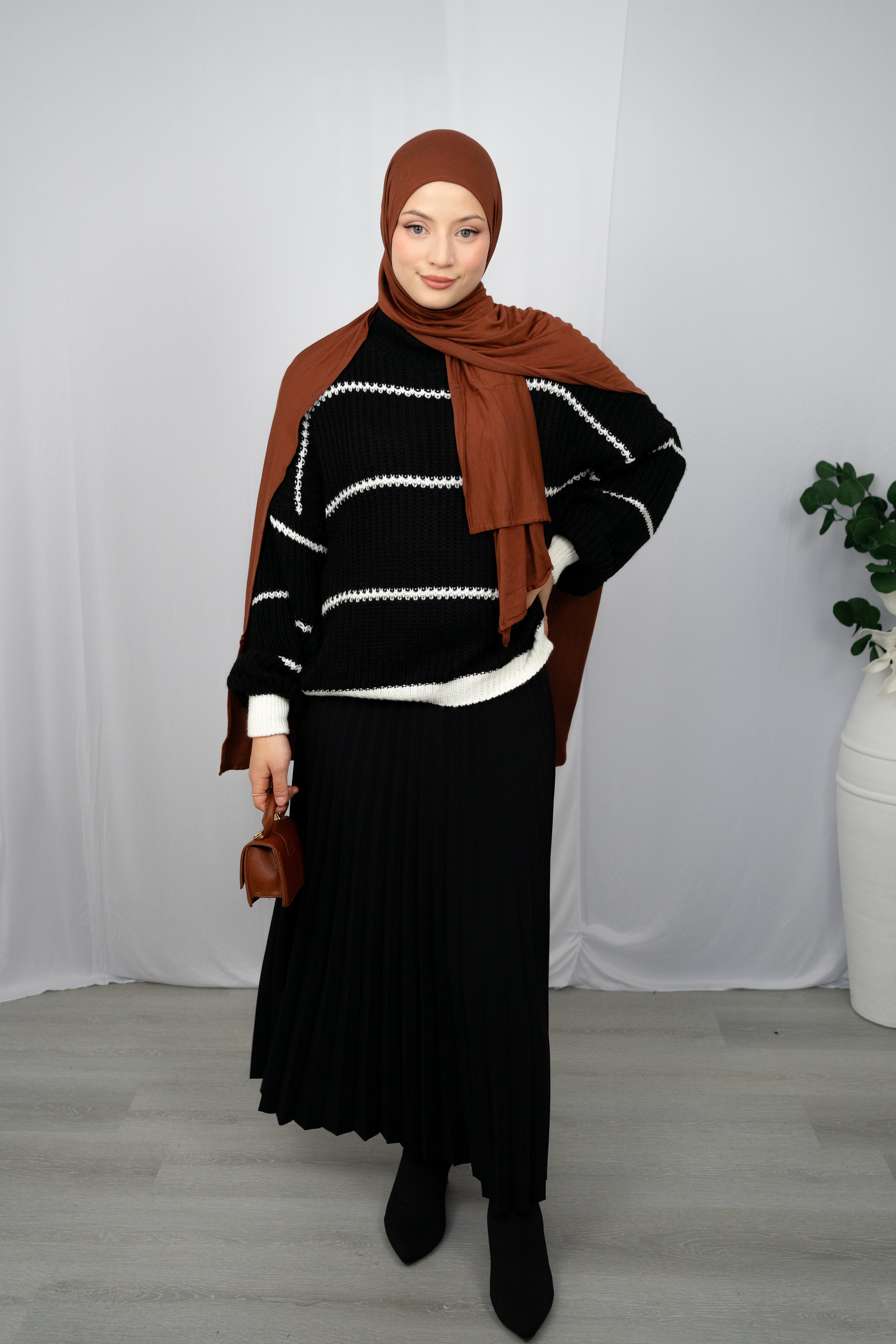 MITTELLANGER FALTENROCK AUS KREPP